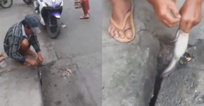 Video: Người đàn ông giật cá trê liên tục ở hố ga trên phố Sài Gòn