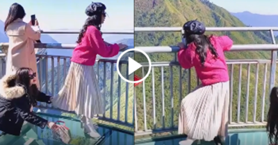 Video: Hai cô gái “can đảm” đi cầu kính trên cao