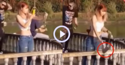 Video: Cô gái ngẩn người khi lỡ tay thả điện thoại xuống ao sau khi chụp ảnh cá