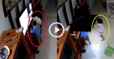 Video: Bé gái gồng mình đỡ tivi do mình làm đổ chờ người giải cứu