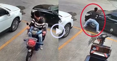 Video: Tài xế nhấc đầu ôtô để lấy lối ra cho xe ba gác