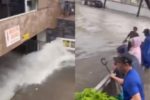 Nước tràn như thác vào hầm chung cư, bảo vệ thoát thân trong gang tấc